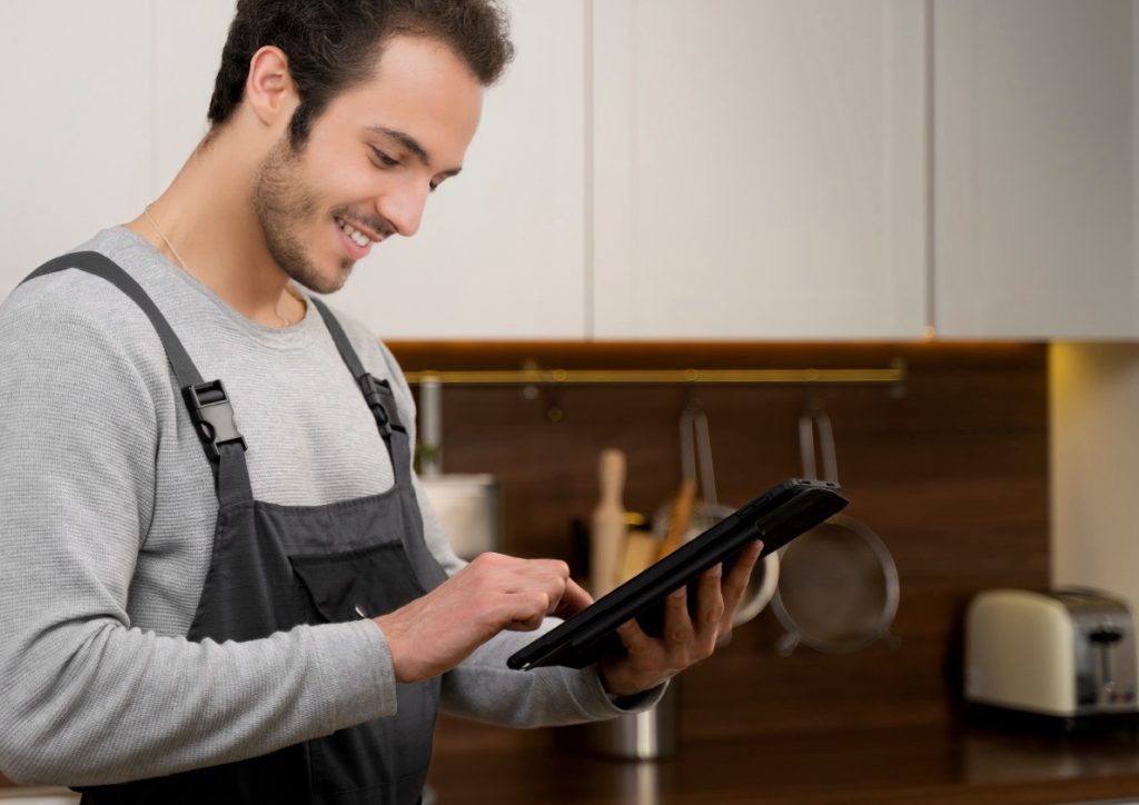 Housing Management - Plumber on Tablet Large